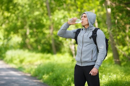 man drinking water